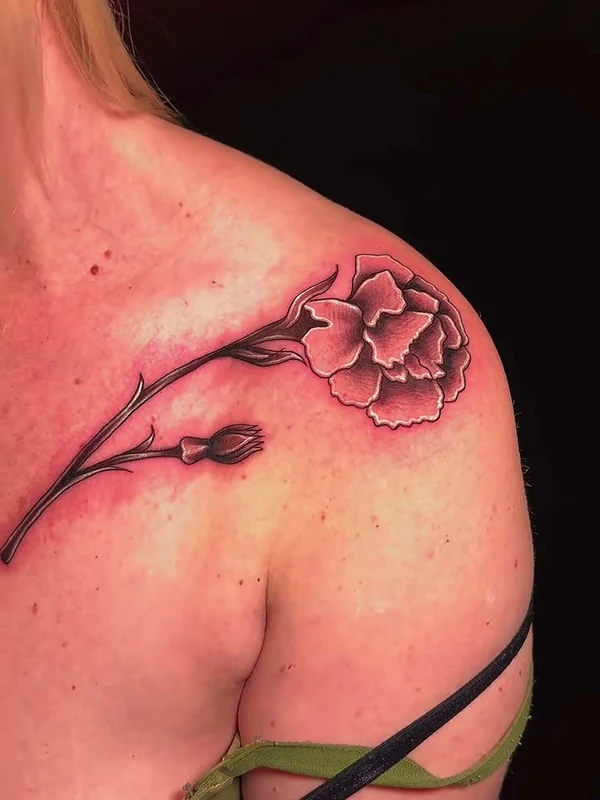 Rose on the shoulder, tattooed by Jordan